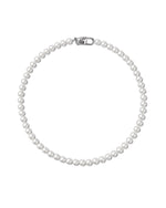 Load image into Gallery viewer, A simple pearl choker.  Minimalist pearl choker featuring a robust clasp. Elevate your style with our necklace, perfect for daily wear and layering. Crafted from faux pearls and available in silver color  Materials: Surgical steel, Faux pearls. 40cm in length. | water-resistant, no-tarnishing, hypoallergenic |
