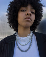 Load image into Gallery viewer, Ice Ice  Statement necklace featuring transparent acrylics and a bold chain. Elevate your style with our necklace, perfect to highlight your outfit. Crafted from high-quality stainless steel and available in silver color  Material: Acrylic, Titanium. 62cm in length. | water-resistant, no-tarnishing, hypoallergenic |
