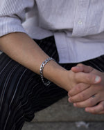 Load image into Gallery viewer, Simple Cuban chain bracelets.   Elevate your style with minimalist bracelets, perfect for daily wear and layering. Crafted from high-quality titanium and available in silver color.  Material: Surgical steel, 21cm in length  | water-resistant, no-tarnishing, hypoallergenic |
