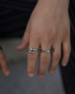 Load image into Gallery viewer, A simple ring resembling actual nails.   Highlight your outfit with the statement piece. Elevate your style with our minimalist ring, perfect for daily wear and layering. Crafted from high-quality titanium and available in silver color.  Material: Titanium.  | water-resistant, no-tarnishing, hypoallergenic |
