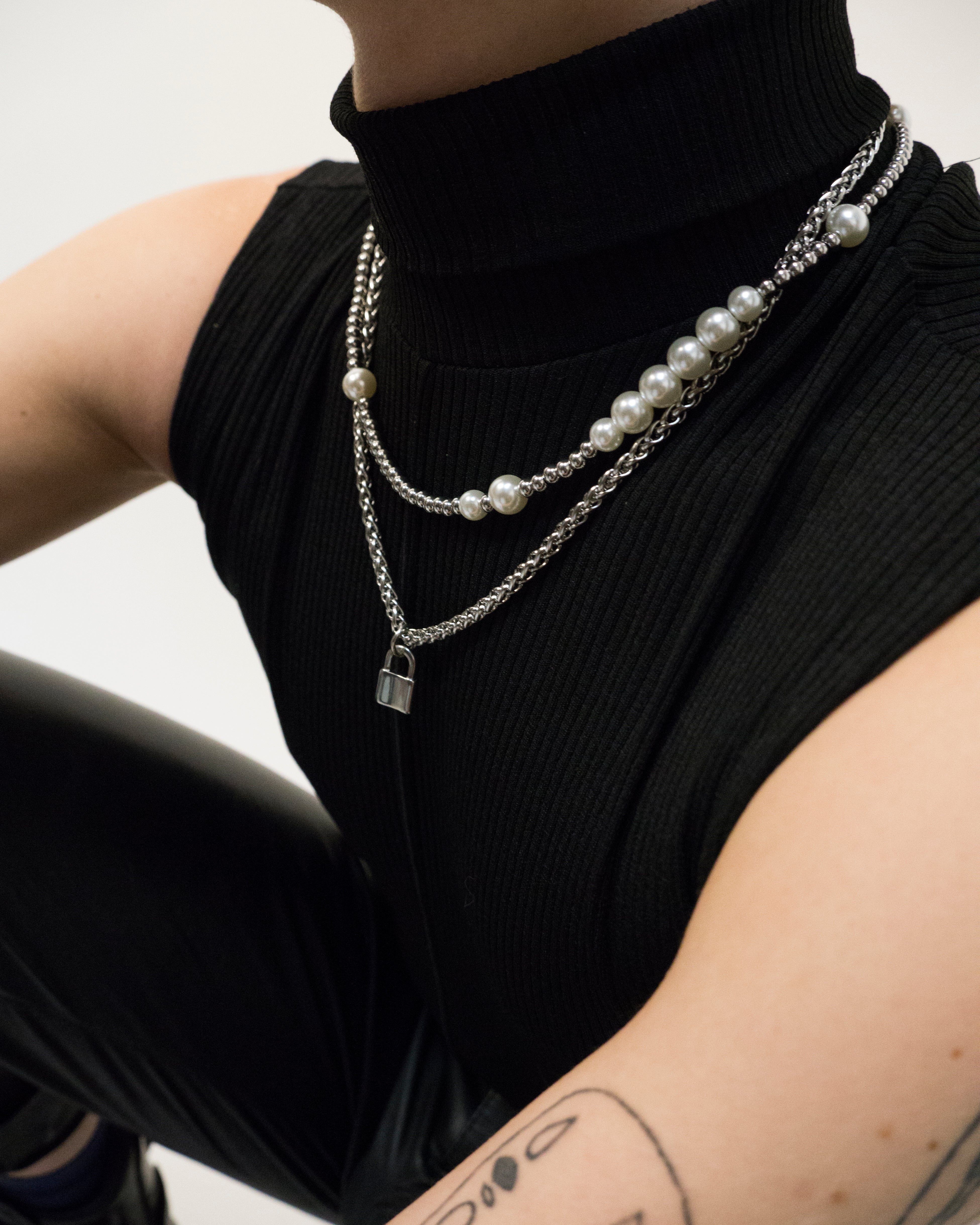 The irregular arrangement of steel balls and pearls.  Statement necklace featuring pearls. Elevate your style with our necklace, perfect for daily wear and layering. Crafted from high-quality titanium and available in silver color  Material: Titanium, Color: Silver 55cm in length.  | water-resistant, no-tarnishing, hypoallergenic |