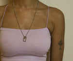 Load image into Gallery viewer, Two rectangles in the same ratio.   Minimalist necklace featuring delicately designed two rectangular pendants. Elevate your style with our necklace, perfect for daily wear and layering.  Crafted from high-quality titanium and available in silver color.  Material: Titanium, 63+5cm in length. | water-resistant, no-tarnishing, hypoallergenic |
