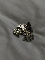 Load image into Gallery viewer, Simple but Bold.  Delicately designed bike chain ring. It does not limit its shape to a circle but swivels around as it moves. Elevate your style with our minimalist ring, perfect for daily wear and layering.  Crafted from high-quality titanium and available in silver color.  Material: Titanium.  | water-resistant, no-tarnishing, hypoallergenic
