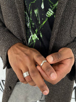 Load image into Gallery viewer, A simple ring resembling the V-shape of the wave crest.   Highlight your outfit with the statement piece. Elevate your style with our minimalist ring, perfect for daily wear and layering. Crafted from high-quality stainless steel and available in silver color.   Material: Surgical steel, Color: Silver | water-resistant, no-tarnishing, hypoallergenic |
