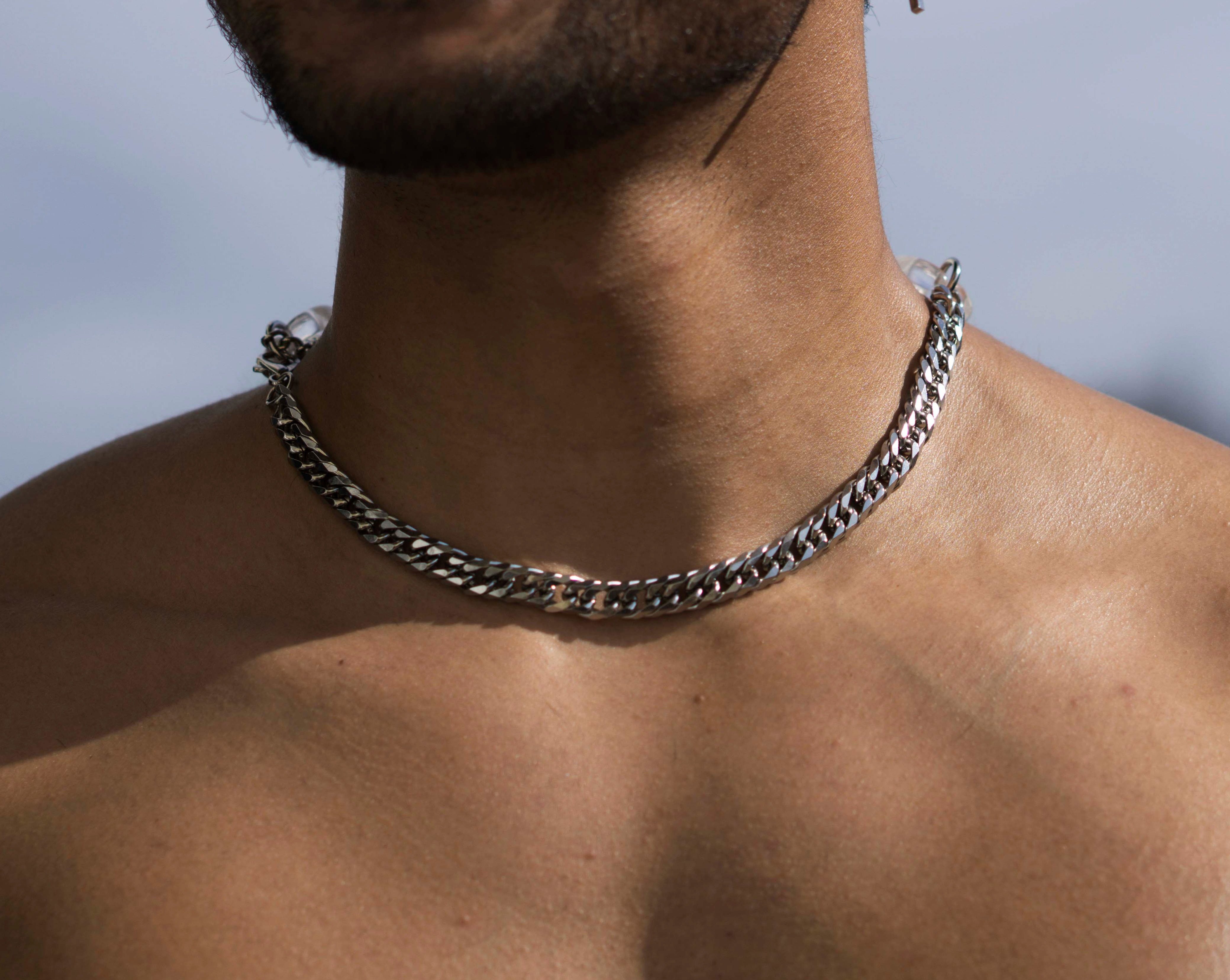 Ice Ice  Statement necklace featuring transparent acrylics and a bold chain. Elevate your style with our necklace, perfect to highlight your outfit. Crafted from high-quality stainless steel and available in silver color  Material: Acrylic, Titanium. 62cm in length. | water-resistant, no-tarnishing, hypoallergenic |