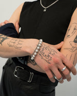 Load image into Gallery viewer, Bracelets with a combination of pearls and thin chains.  Minimalist bracelets featuring pears and chains. Elevate your style with statement pieces, perfect for daily wear and layering. Crafted from high-quality stainless steel and available in silver color  Material: Titanium, Faux pearls. Color: Silver. 18+7cm in length.  | water-resistant, no-tarnishing, hypoallergenic |
